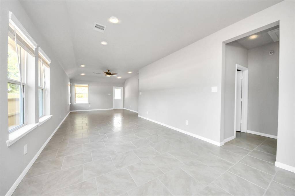 Make memories gathered around the table with your family and friends! This spacious dining room features elegant flooring, custom paint, and adjacent to family room and kitchen for open concept feel.