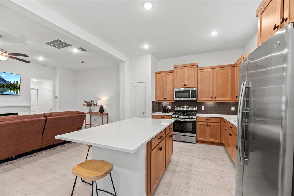 Additional seating at the kitchen island.
