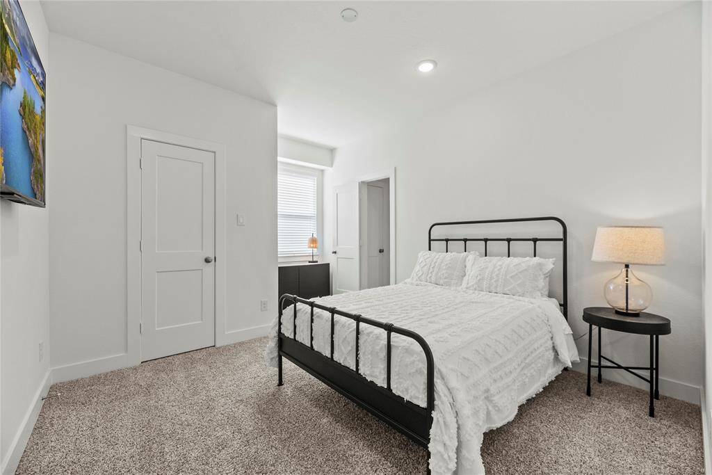 Spacious secondary bedrooms offer ample closet space and direct access to a full bathroom.