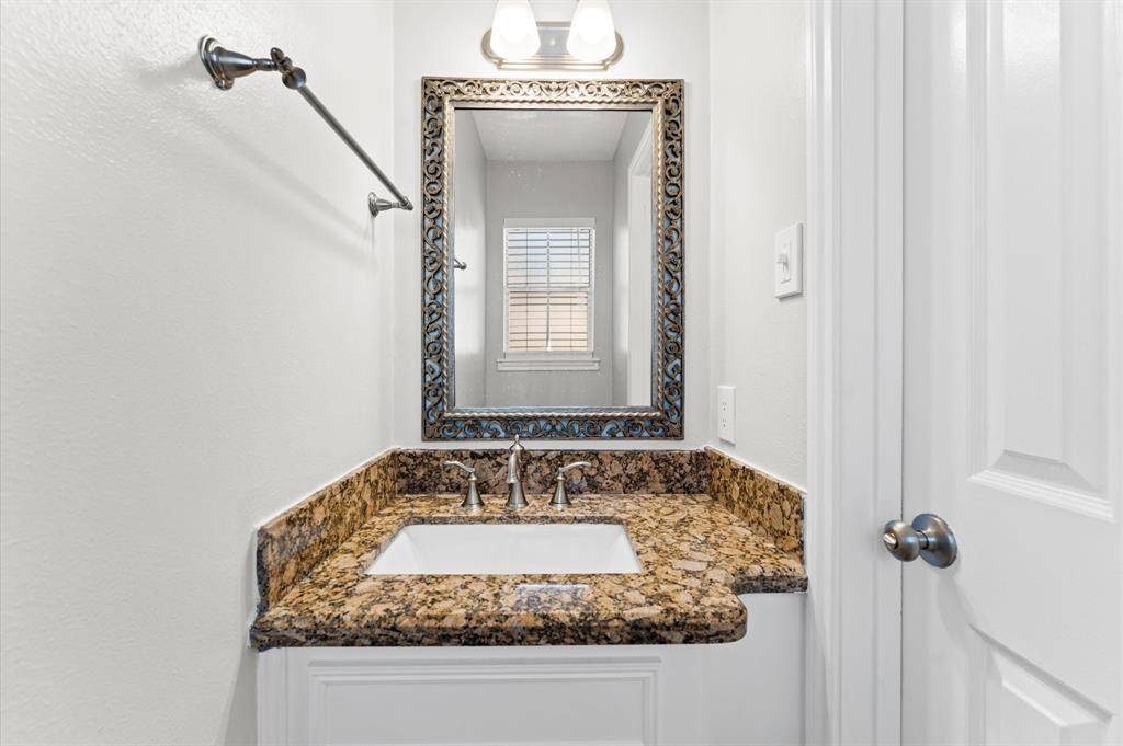 Powder room is located in the laundry room area...don't miss it!