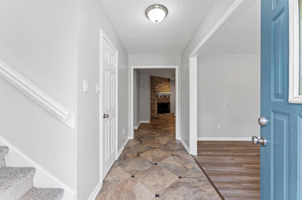 This inviting home welcomes you, offering a warm glimpse inside.