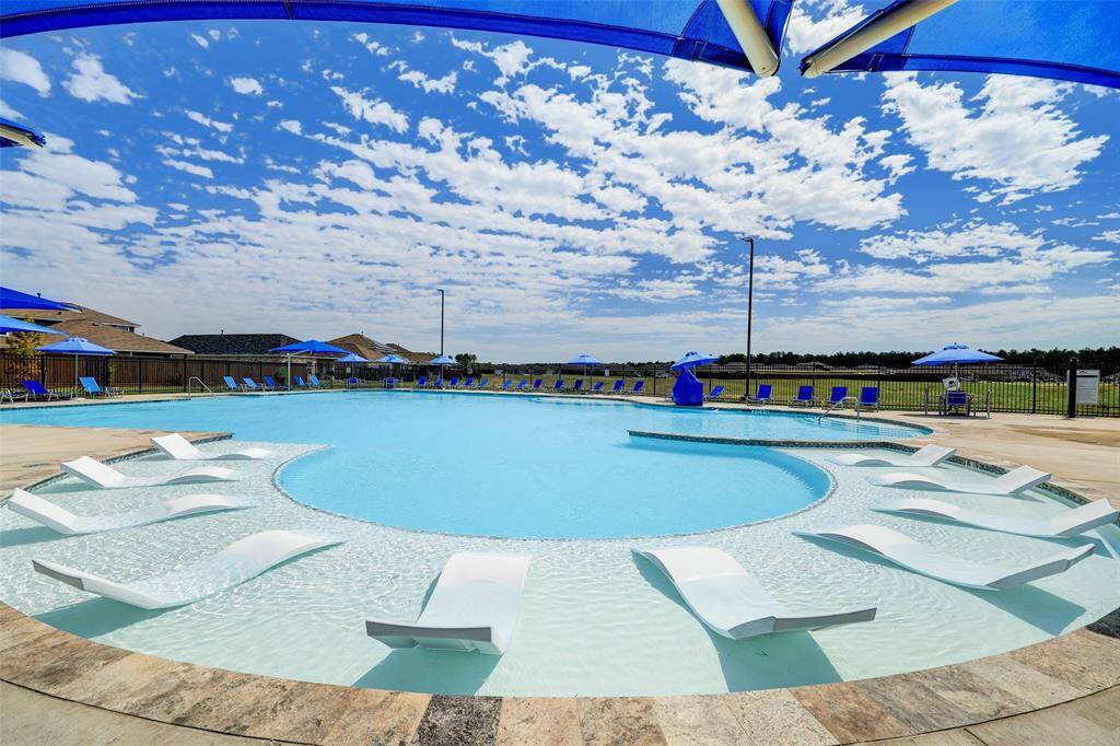 Relax and rejuvenate in the resort style pool at the Community Amenities Center in Harrington Trails!