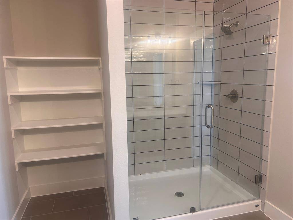 Rinse off the stresses of your day in this oversized shower.