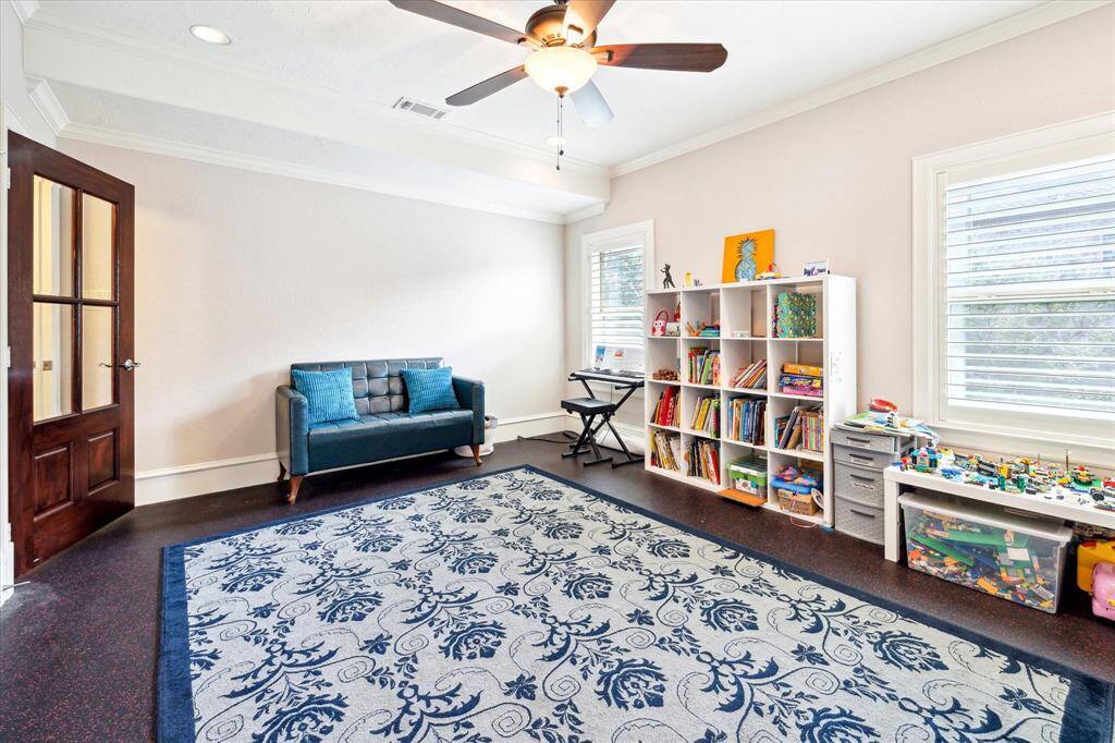 [Extra room] Located on the second floor, this room could easily serve as a fifth bedroom. This spacious room features a large closet and access to a vast attic space, perfect for all your storage needs.