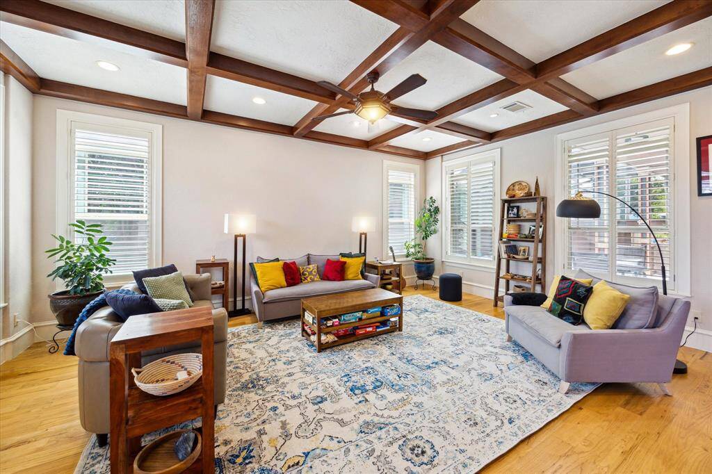 Step through the front door into a formal entryway with soaring ceilings and a spacious family room.