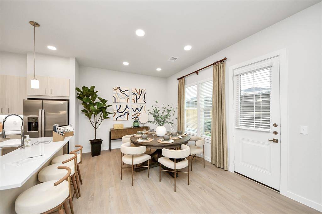 ! Boasting modern finishes, quartz counters, tile backsplash,stainless appliances,refrigerator,washer & dryer,walk-in pantries,walk-in closets,wood-like floors throughout,9ft ceilings