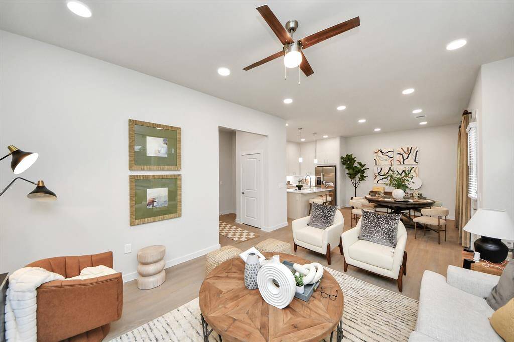 ! Boasting modern finishes, quartz counters, tile backsplash,stainless appliances,refrigerator,washer & dryer,walk-in pantries,walk-in closets,wood-like floors throughout,9ft ceilings