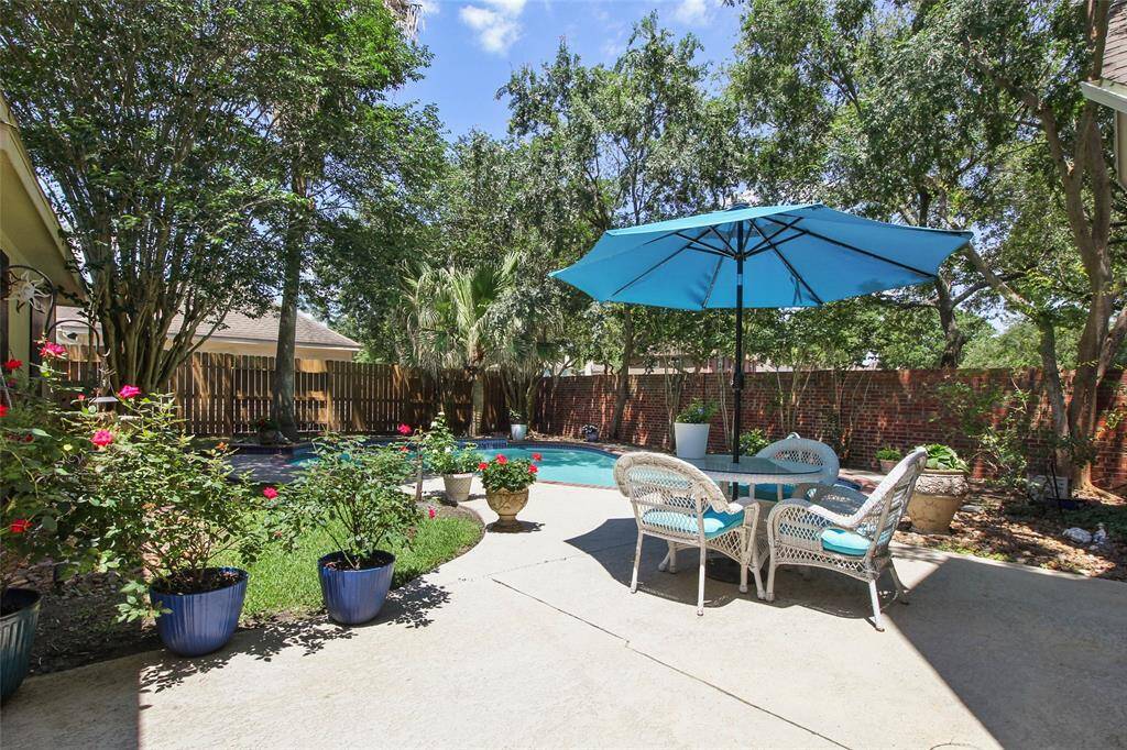 Vacation 365 days a year in your own back yard oasis complete with pool.