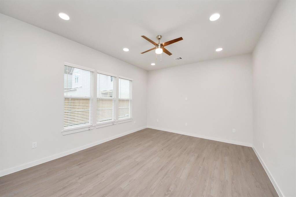 Open Living Concept…Boasting modern finishes, wood-like floors throughout and 9ft ceilings.