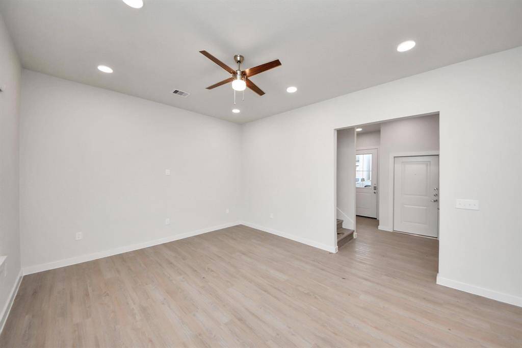 Open Living Concept…Boasting modern finishes, wood-like floors throughout and 9ft ceilings.