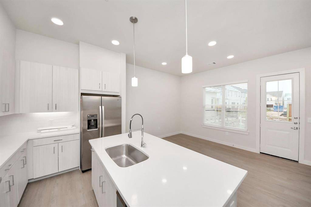 Stylish Island kitchens and open concept floor plans.Boasting modern finishes, quartz counters, tile backsplash,stainless appliances,refrigerator,washer & dryer,walk-in pantries,walk-in closets,wood-like floors throughout,9ft ceilings.