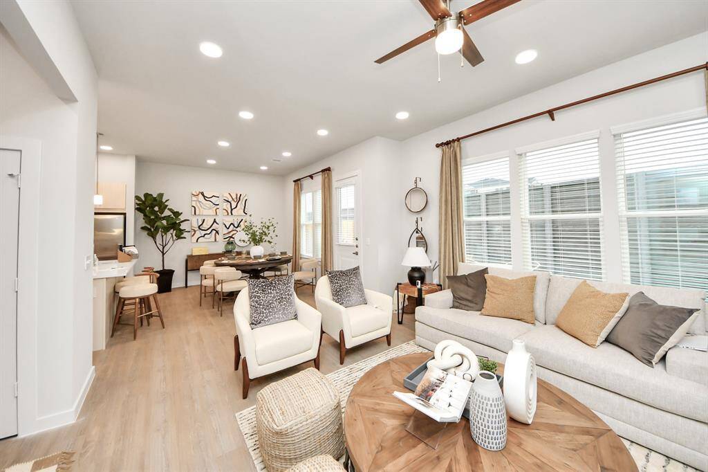 Boasting modern finishes, quartz counters, tile backsplash,stainless appliances,refrigerator,washer & dryer,walk-in pantries,walk-in closets,wood-like floors throughout,9ft ceilings
