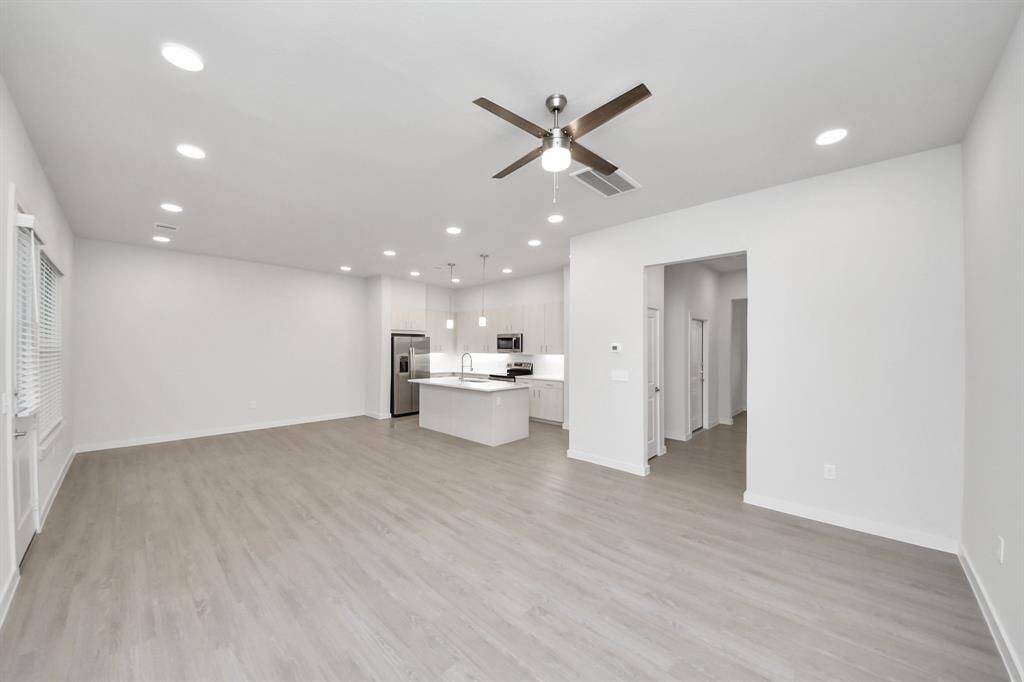 Boasting modern finishes, quartz counters, tile backsplash,stainless appliances,refrigerator,washer & dryer,walk-in pantries,walk-in closets,wood-like floors throughout,9ft ceilings
