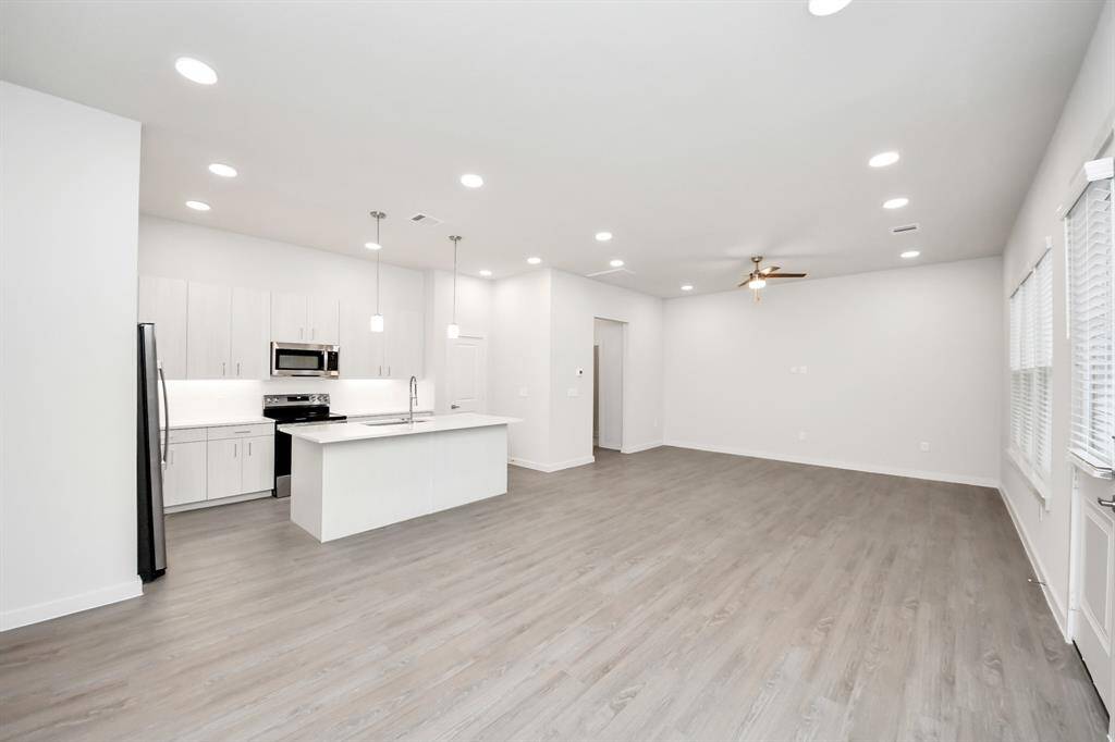 Stylish Island kitchens and open concept floor plans.! Boasting modern finishes, quartz counters, tile backsplash,stainless appliances,refrigerator,washer & dryer,walk-in pantries,walk-in closets,wood-like floors throughout,9ft ceilings.