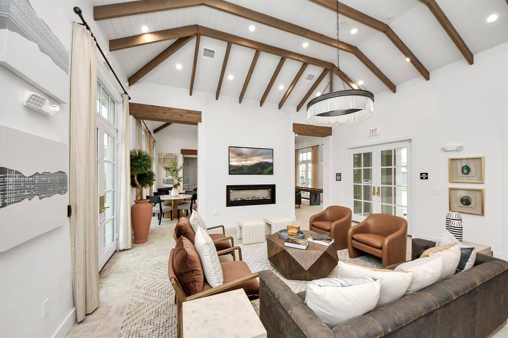 Residents can enjoy the community center with relaxing lounge areas, catering kitchen, coffee bar and games. Great for entertaining!