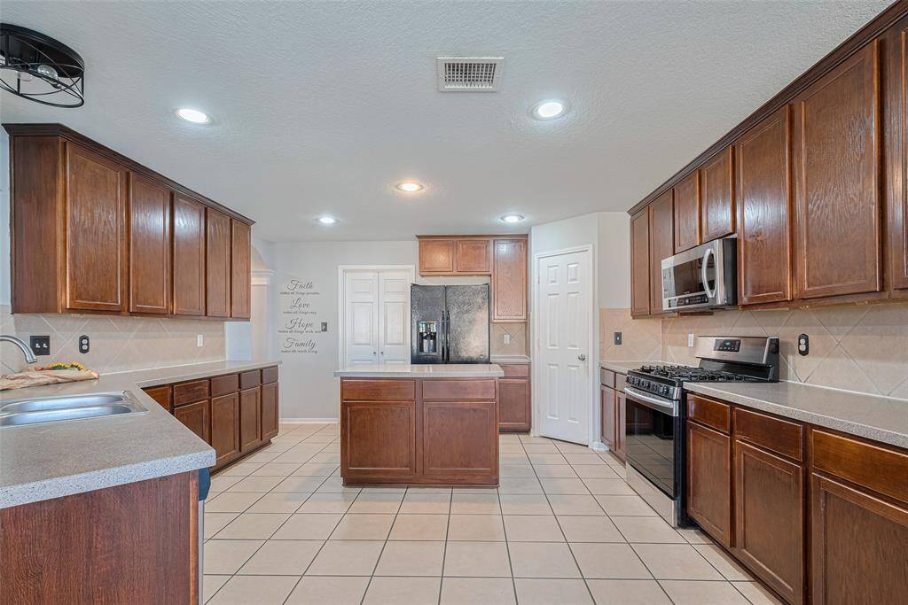 Plenty of room to create in the well-appointed kitchen.