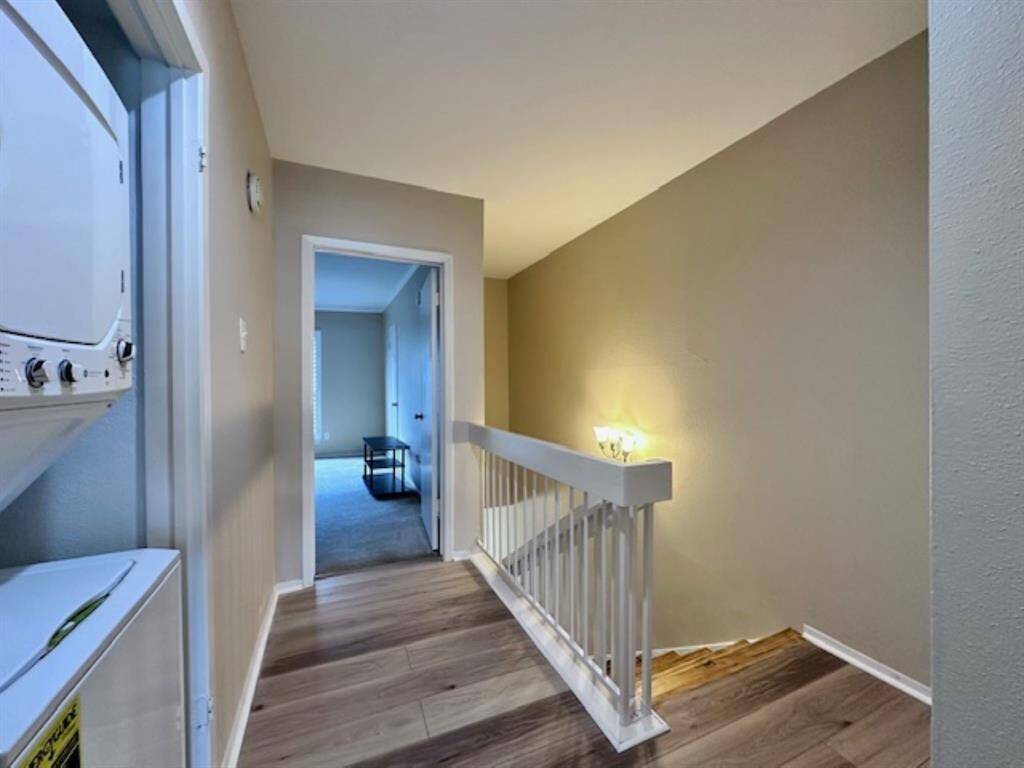 Upstairs landing and laundry area.