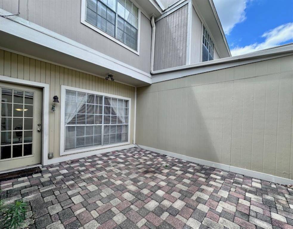 Patio with storage closet.