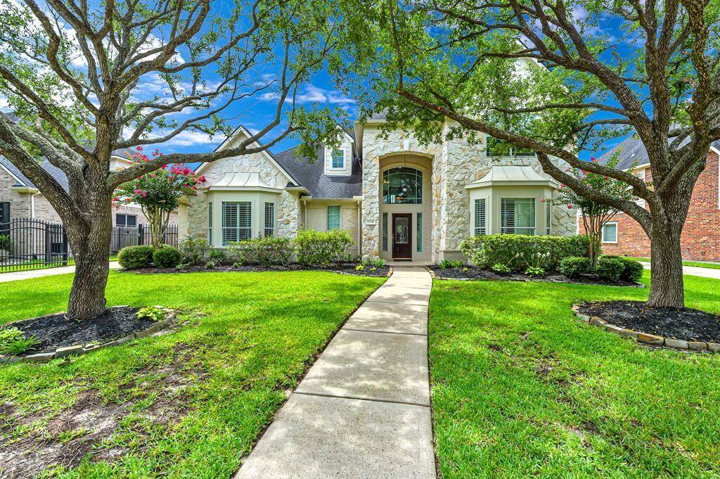 Beautiful landscaping gives this home great curb appeal.