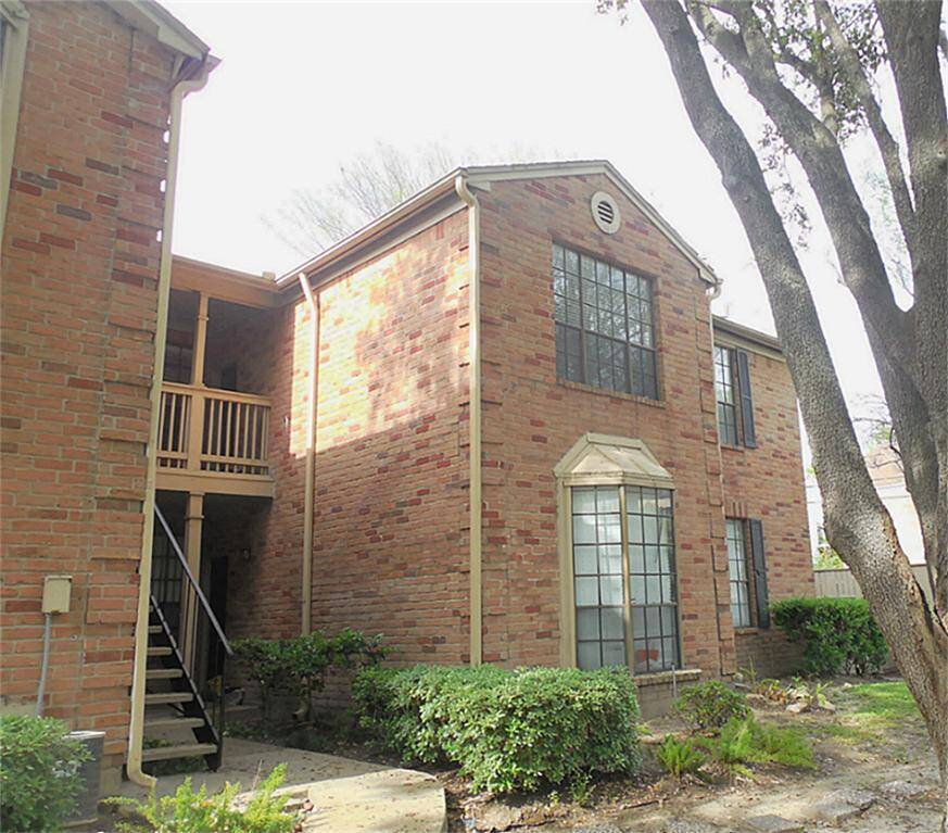 Second floor condo in the back of the property