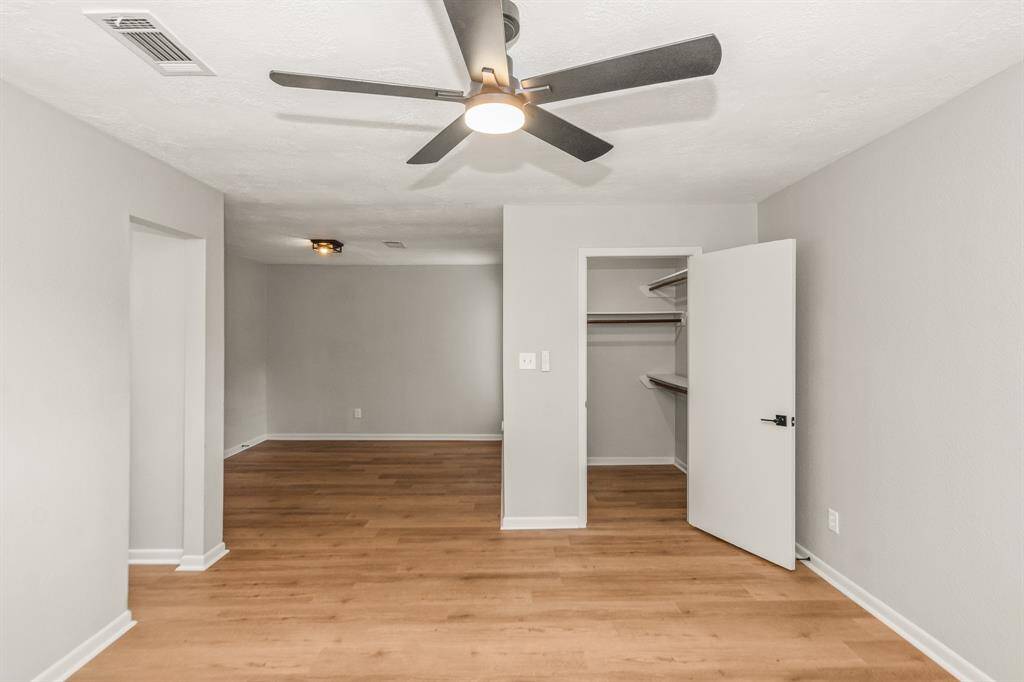A view showing the primary is spacious enough to accommodate a sitting area, reading nook, or office space.