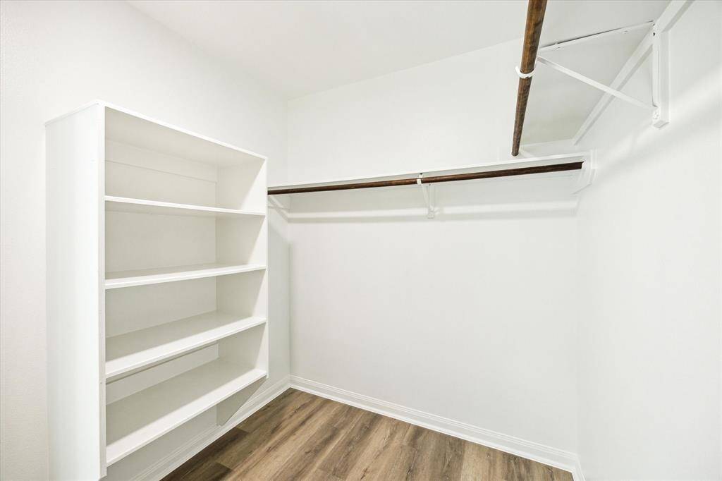 One of the two primary closets.