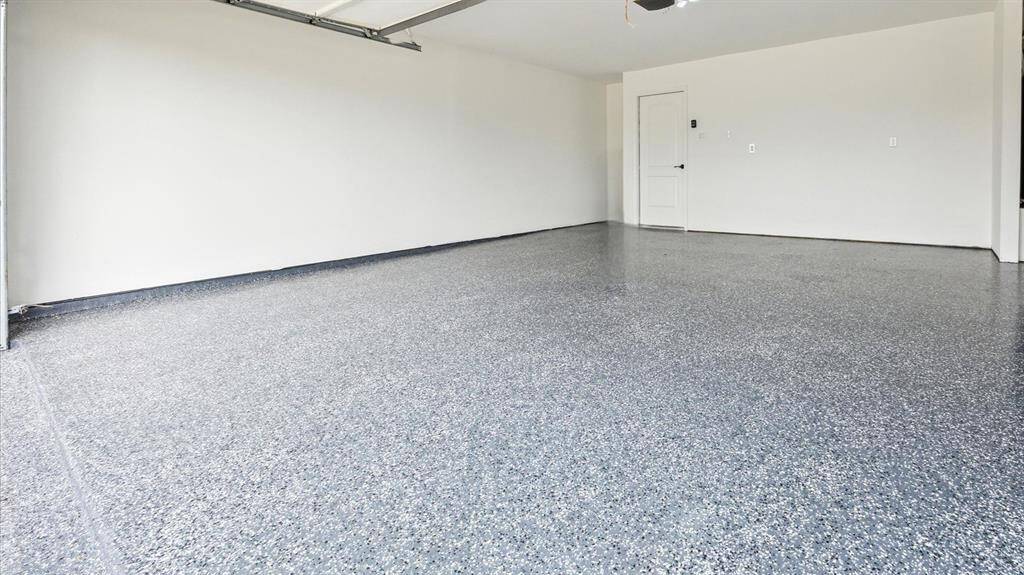 Garage with new epoxy flooring.