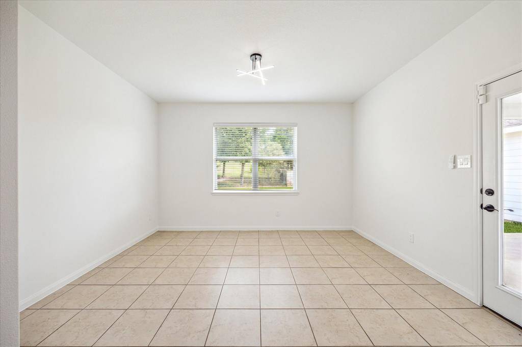 Dining room with access to the backyard.