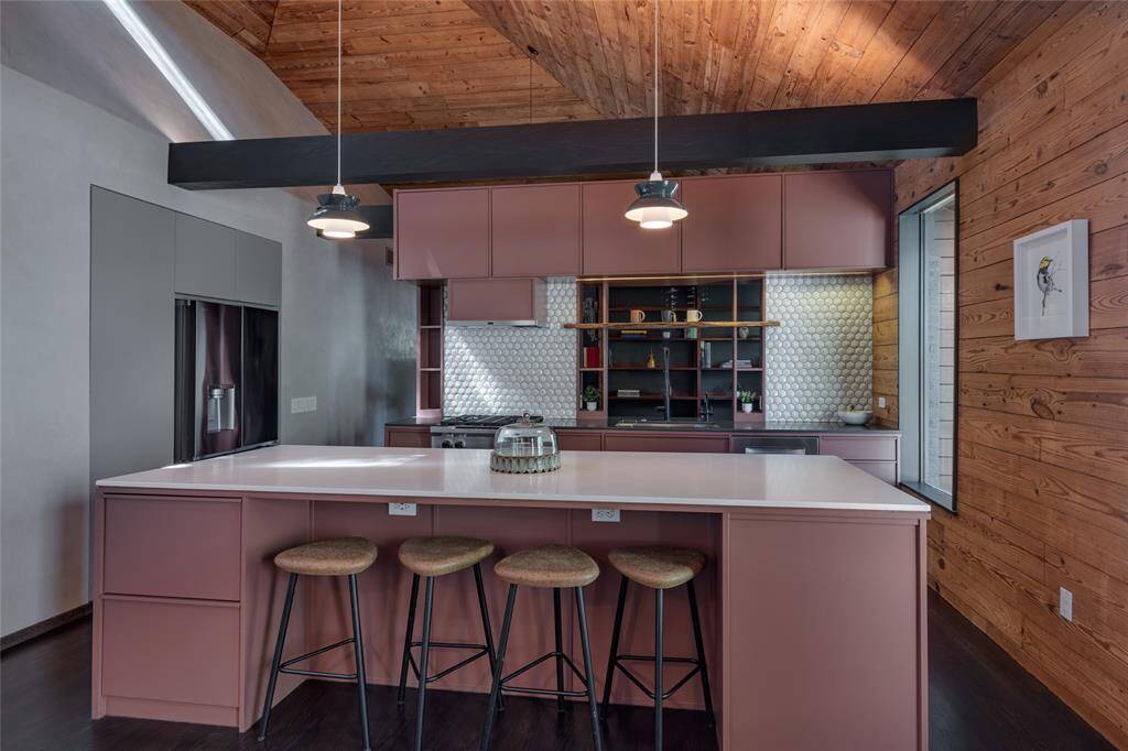 A view looking into the open concept from the kitchen into the dining area.