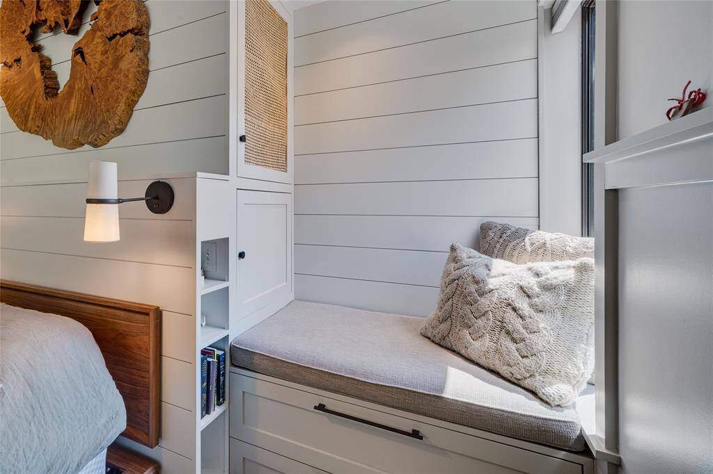 Secondary Bedroom has a built in closet with a desk, very nice room for kids of all ages.
