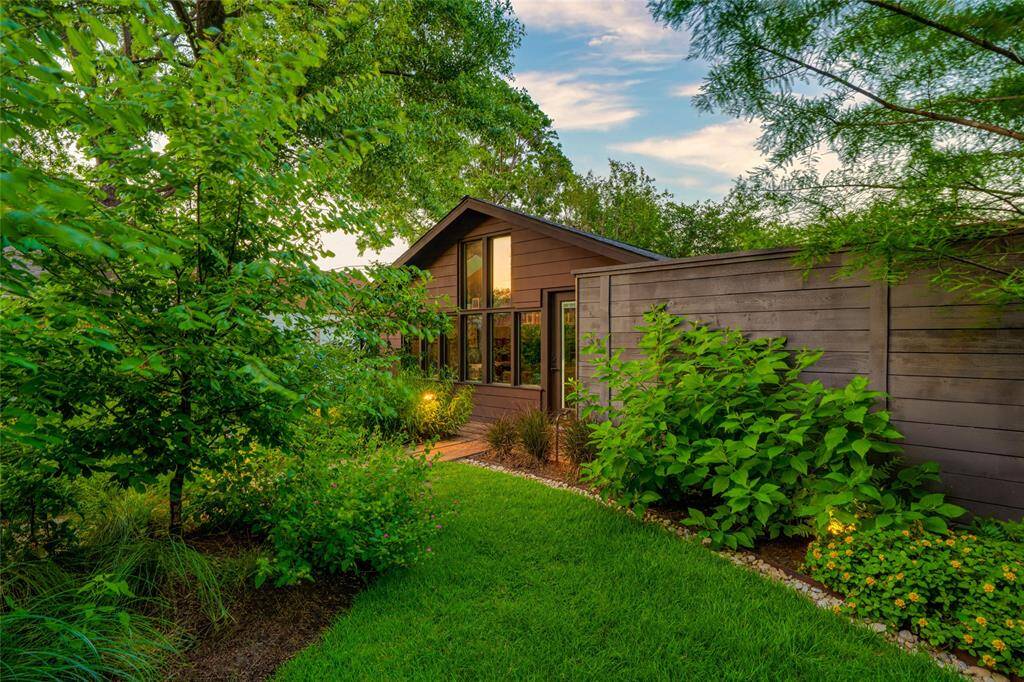 Discover the perfect creative retreat with a stylishly converted garage studio/office.