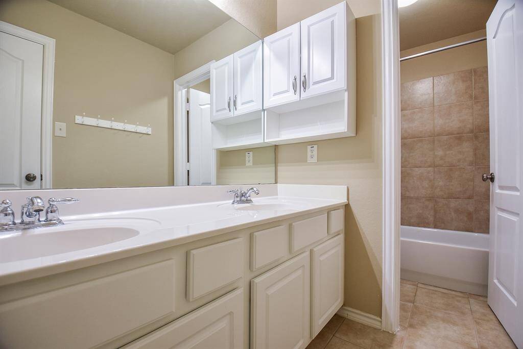 Upstairs bathroom with double sink