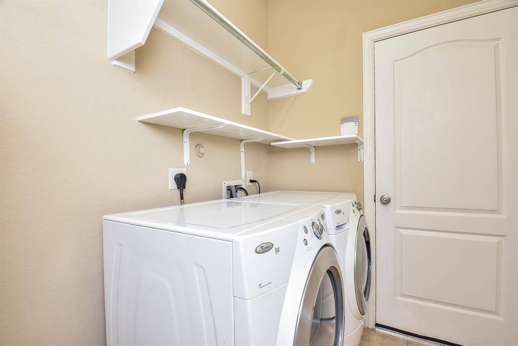 Utility room with washer, dryer