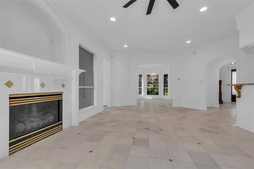Plenty of room for a pool table or a large sectional.  Gas log fireplace to enjoy on cool evenings.