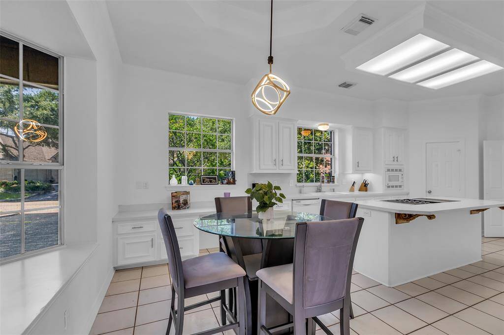Breakfast area with a seat bay window.  Nice built-in desk also.
