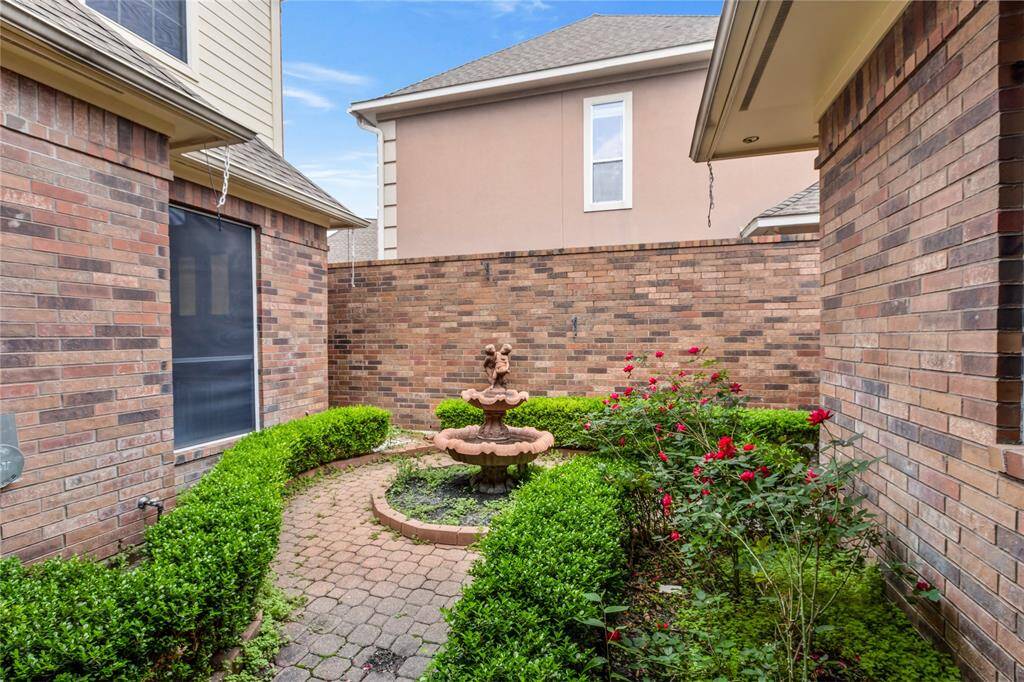 Right outside the double French doors you will find this nice patio with your own fountain!