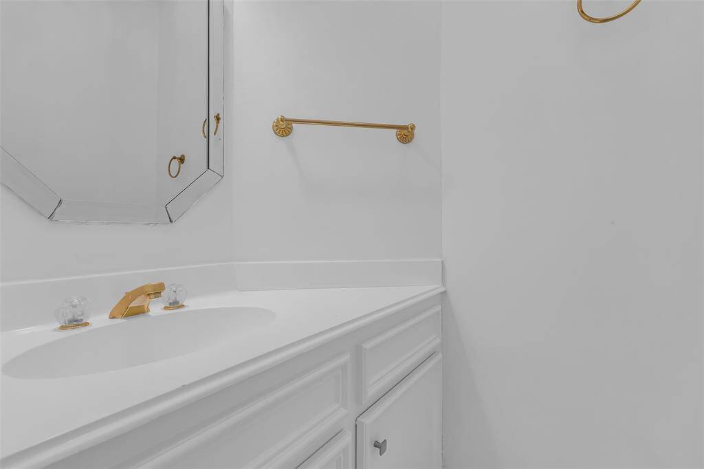 One of the half baths downstairs.  Fresh paint to brighten it up!