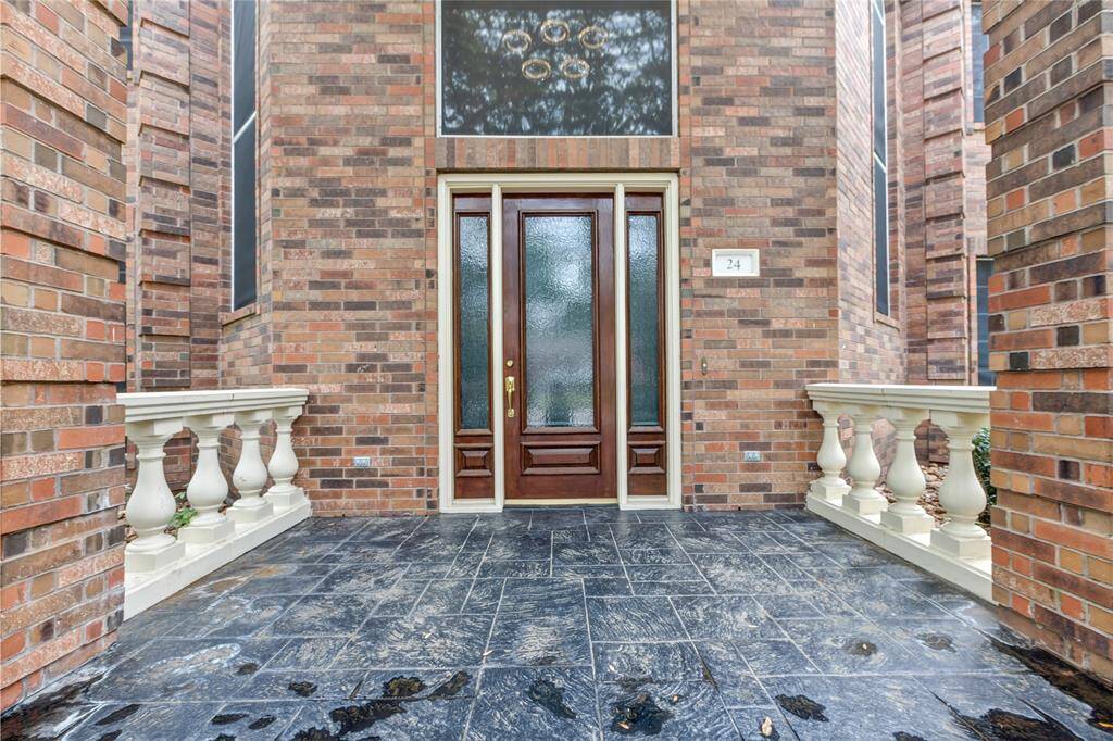 Make a lasting impression with this striking entrance. A home designed to captivate!