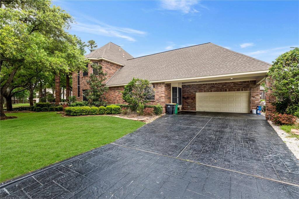 This charming gated community boasts meticulously maintained yards and driveways, reflecting true pride of ownership.  2 car garage with automatic opener and 2 car  porte-cochere.