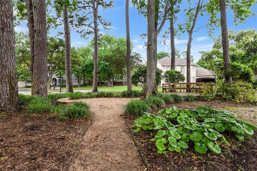 This photo is of the shared neighborhood seating area in front of the home. A peaceful, natural setting, ideal for those seeking a tranquil environment.