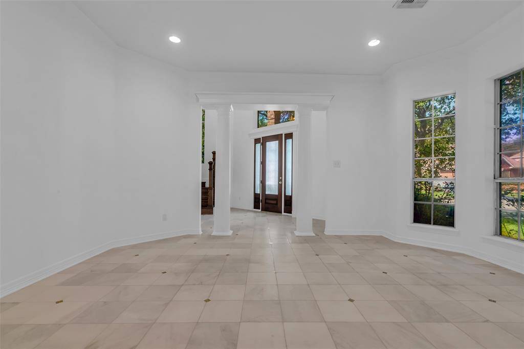 High ceilings and ample room in the front of your home.  All fresh paint!