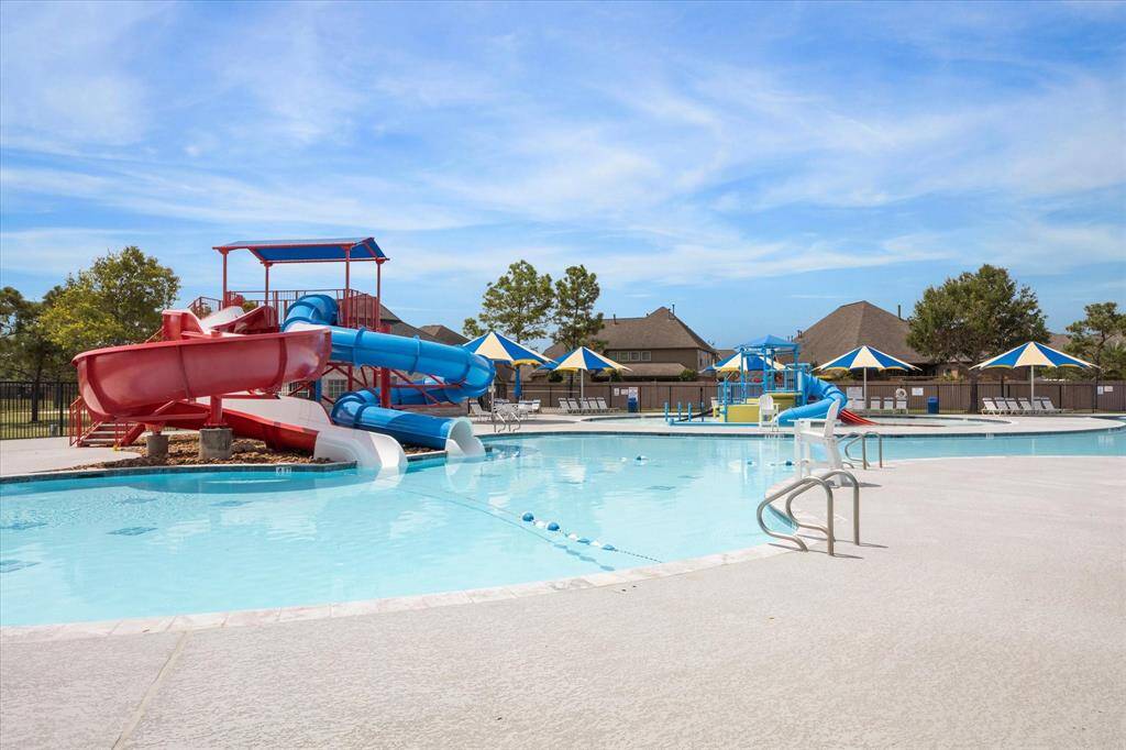Subdivision has 3 swimming, pool, tennis court, club house, splash pad and Water slide