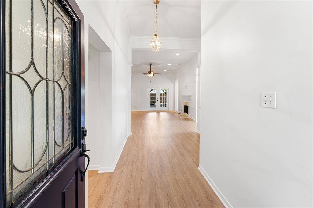 The front door opens to a foyer that leads to the living room.
