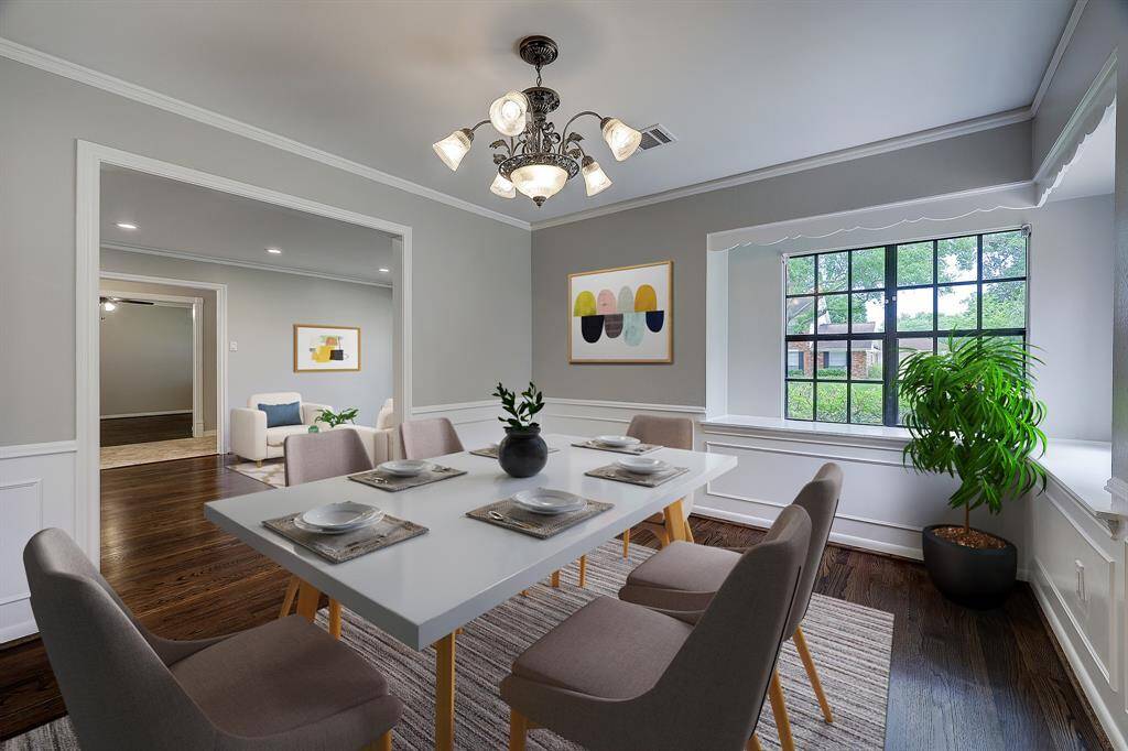 Formal Den which opens up to the Dining area