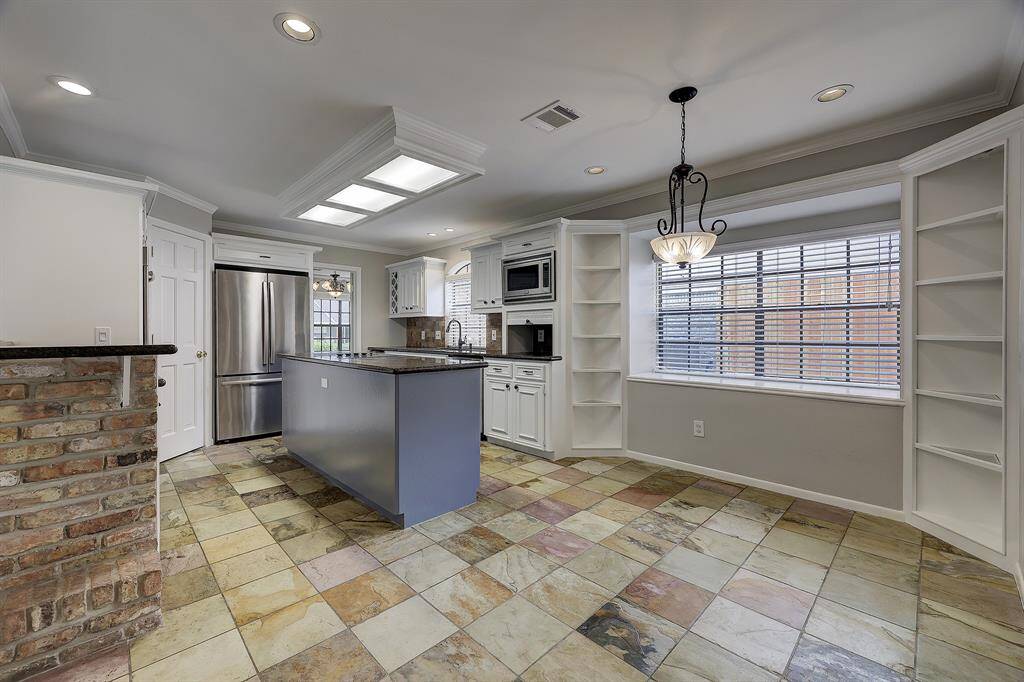 Chef's dream kitchen with double ovens,  SS appliances and tons of cabinets/storage space