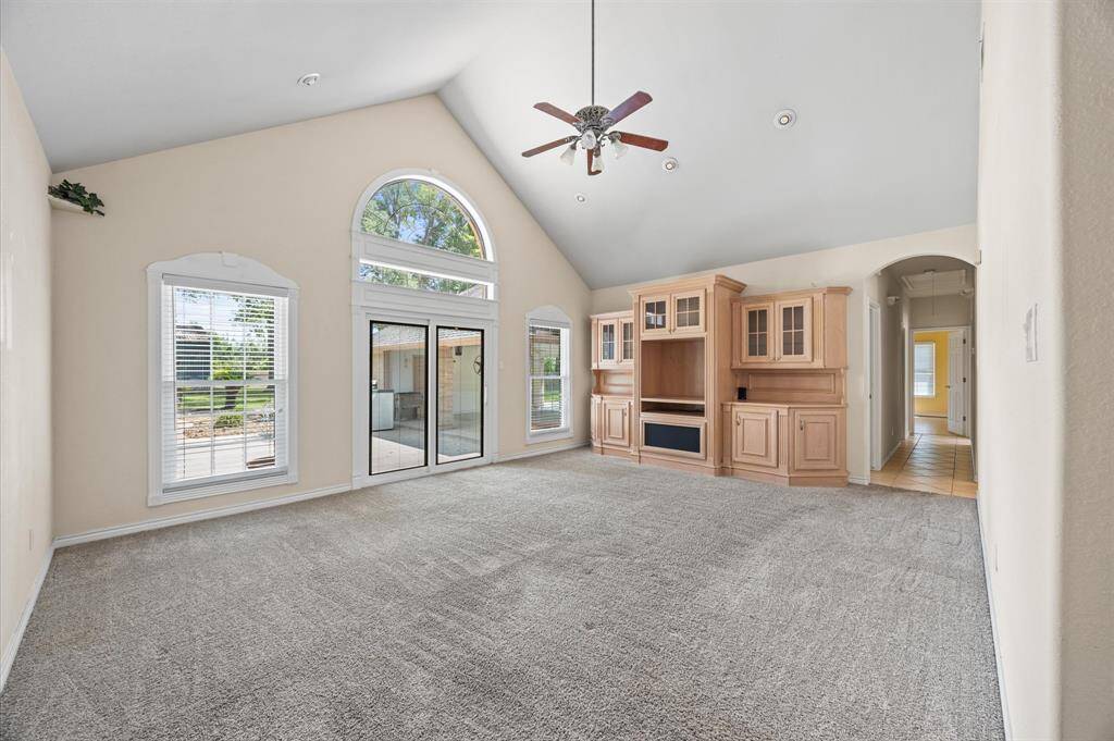 Loads of natural light & accessible to back deck with view of pool
