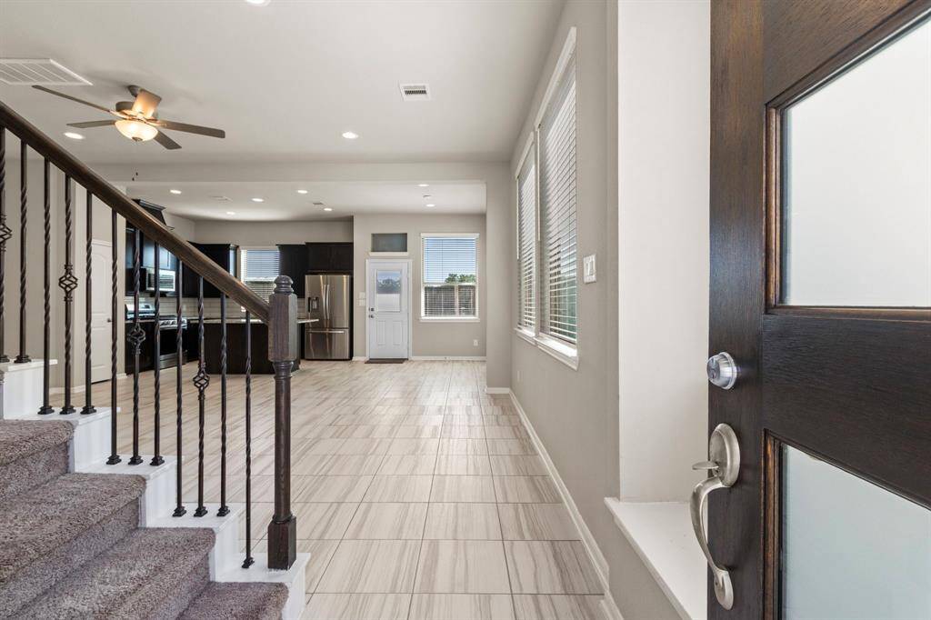 Step into this inviting townhouse, featuring an open layout with abundant natural light and modern finishes.