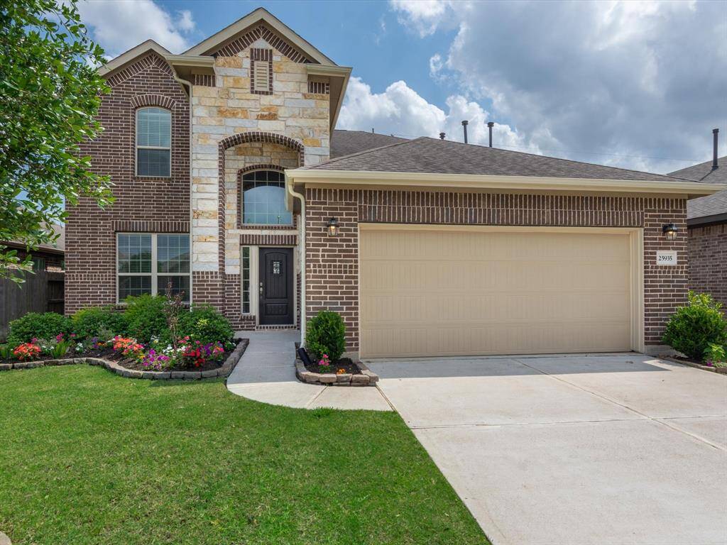 Welcome to 25935 Northern Sky Drive in Creekside Ranch!