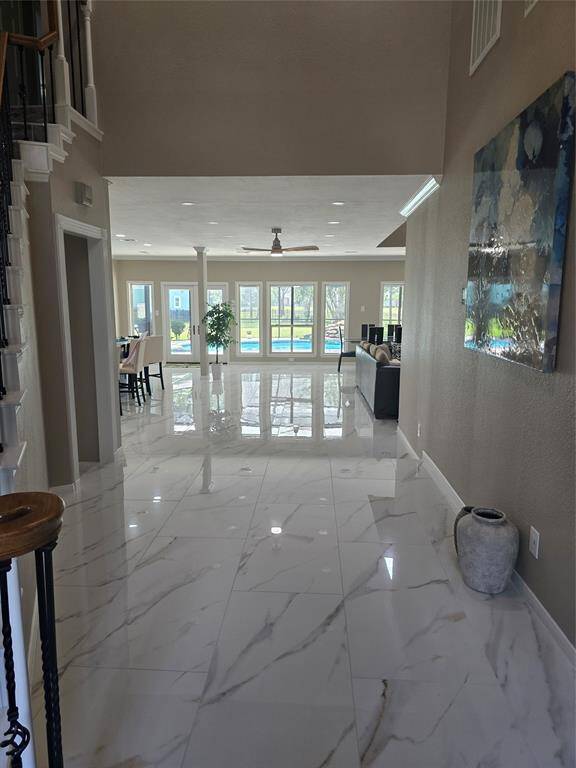 Professional photos coming- view from foyer through home