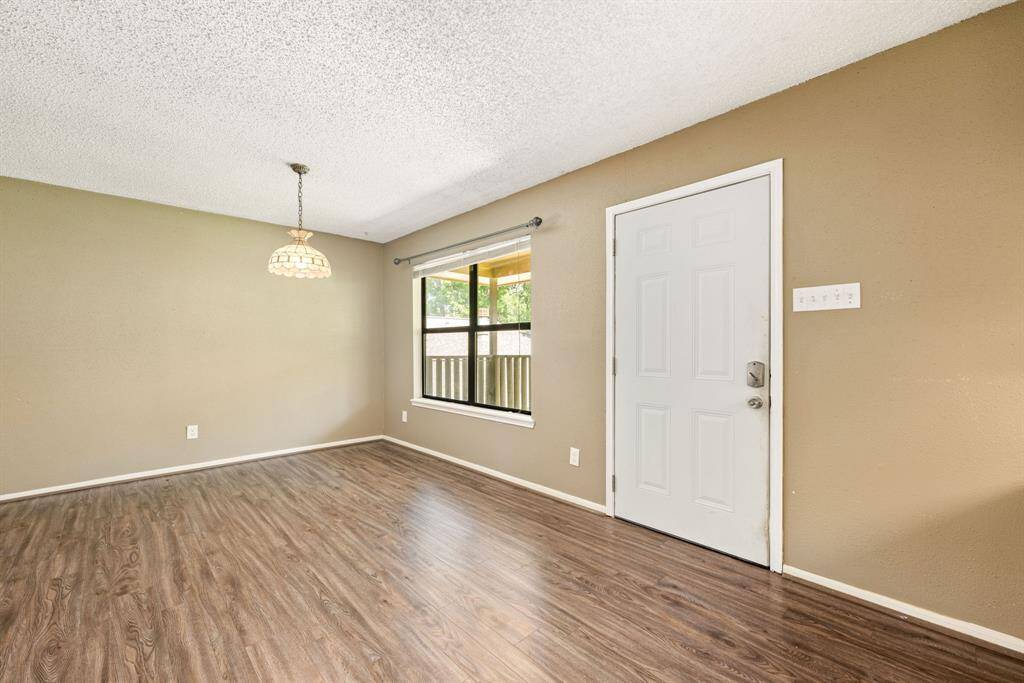 The entrance of the garage apartment above detached garage with it's own private entry and balcony over looking the back yard.